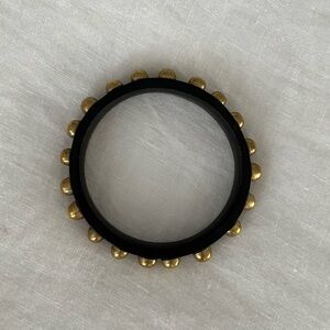 Vintage black wood bangle with brass studs